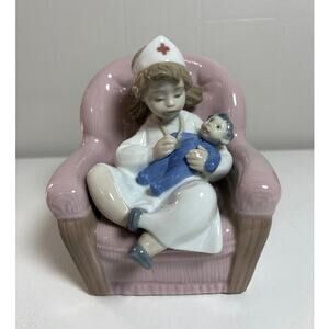 NAO Handmade in Spain by Lladro Girl Playing Nurse #1055 Figurine